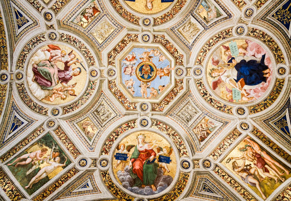 Detailed Renaissance ceiling artwork with vivid frescoes and ornate designs in Vatican City.