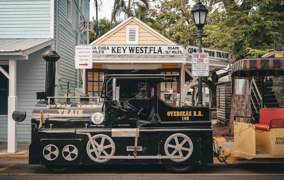 Scenic view of Conch Tour Train parked in Key West, Florida, capturing a vintage travel charm.