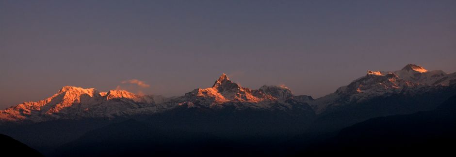 Stunning view of snowcapped Annapurna mountains at sunset from Narchyang, Nepal.